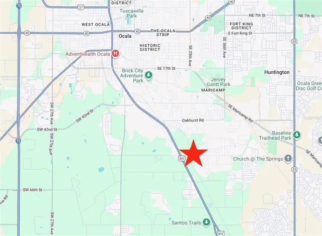 a picture of a glass door with a tree