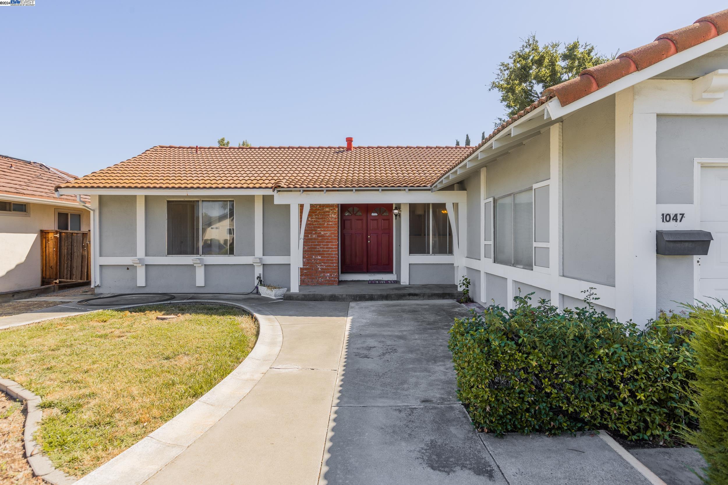 1047 Lakehurst Road Livermore, CA 94551 - Photo 1 of 1 a view of a house with swimming pool in front of it