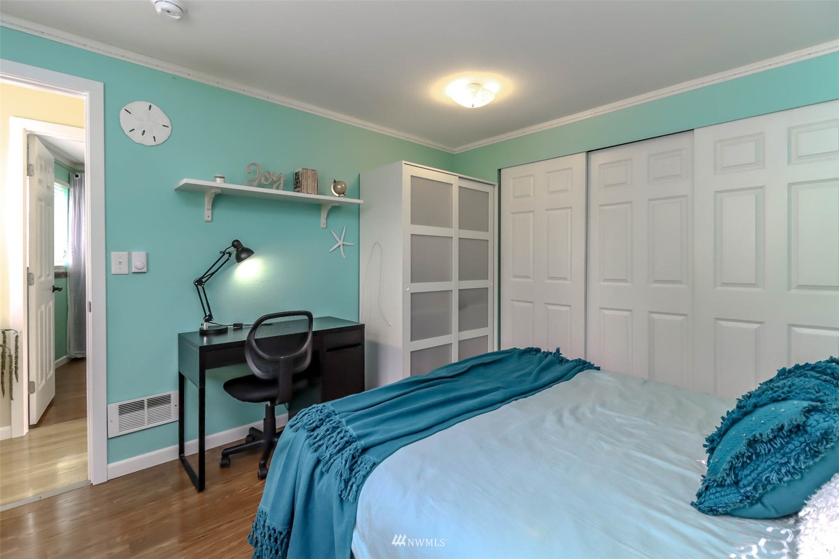 2221 182nd Street Southeast Bothell, WA 98012 - Photo 26 of 39 a bedroom with a bed and a chair