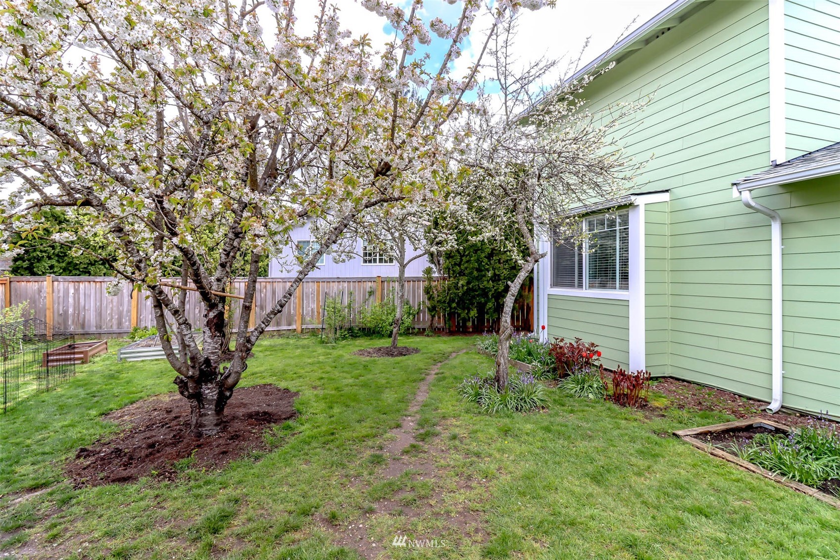 2221 182nd Street Southeast Bothell, WA 98012 - Photo 31 of 39 a view of a house with backyard and garden