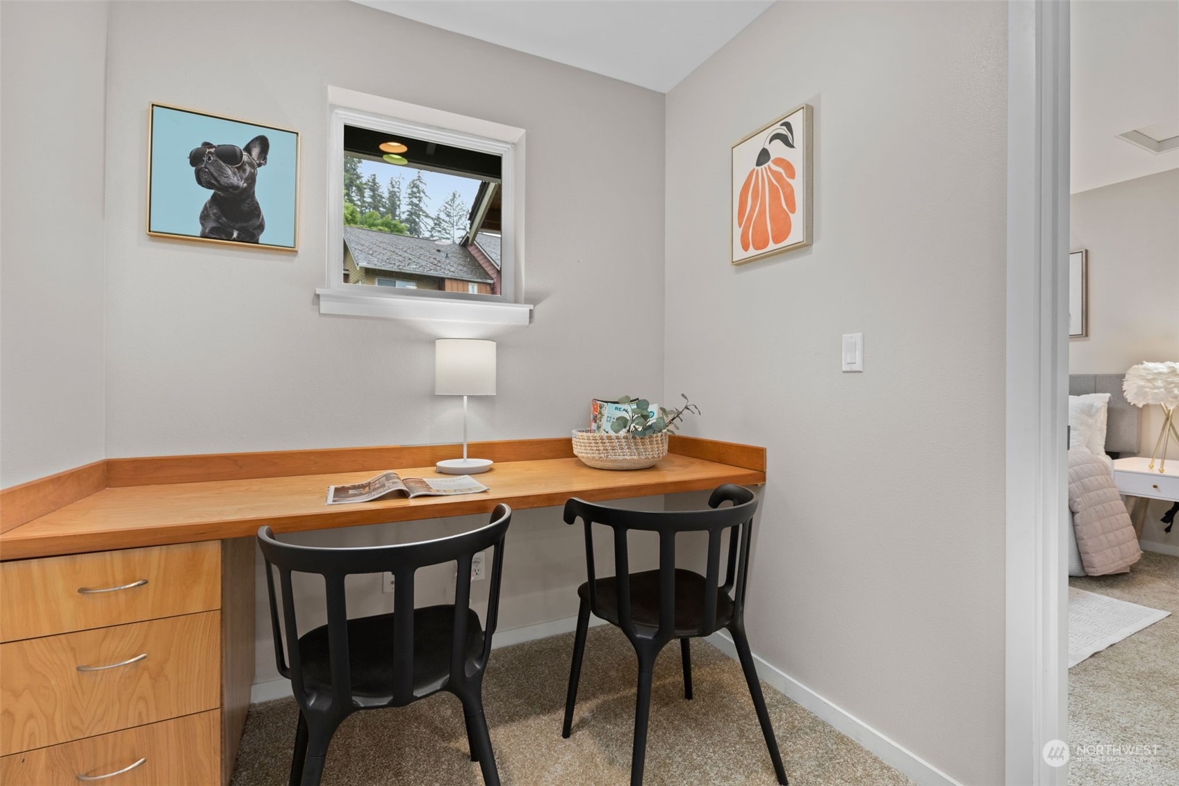 58 Cougar Ridge Road Northwest, Unit 2203 Issaquah, WA 98027 - Photo 15 of 37 a view of a dining room with furniture and wooden floor