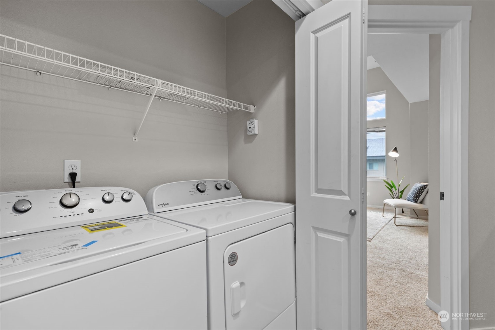 58 Cougar Ridge Road Northwest, Unit 2203 Issaquah, WA 98027 - Photo 27 of 37 a utility room with dryer and washer
