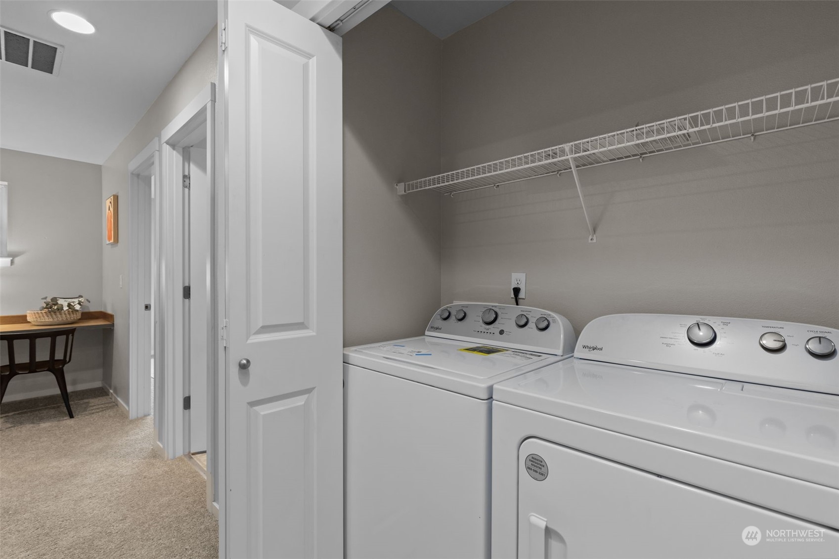 58 Cougar Ridge Road Northwest, Unit 2203 Issaquah, WA 98027 - Photo 28 of 37 a view of storage and utility room with washer and dryer
