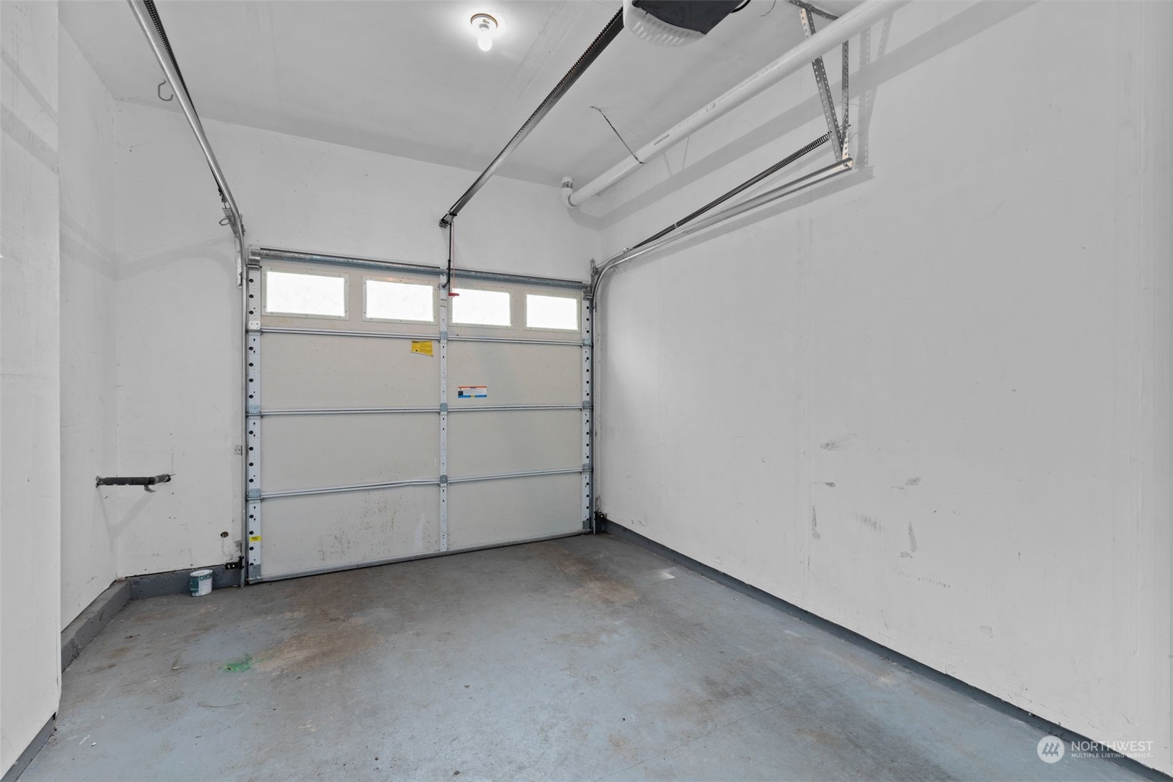 58 Cougar Ridge Road Northwest, Unit 2203 Issaquah, WA 98027 - Photo 34 of 37 a view of a garage