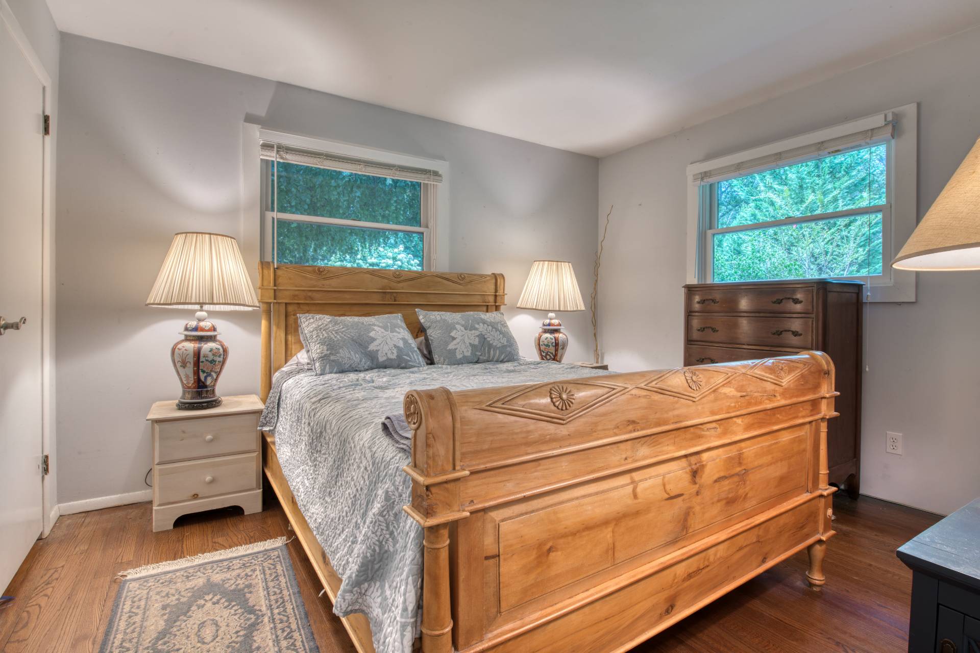 1 Abigails Path East Hampton, NY 11937 - Photo 9 of 18 a bedroom with a bed and a window
