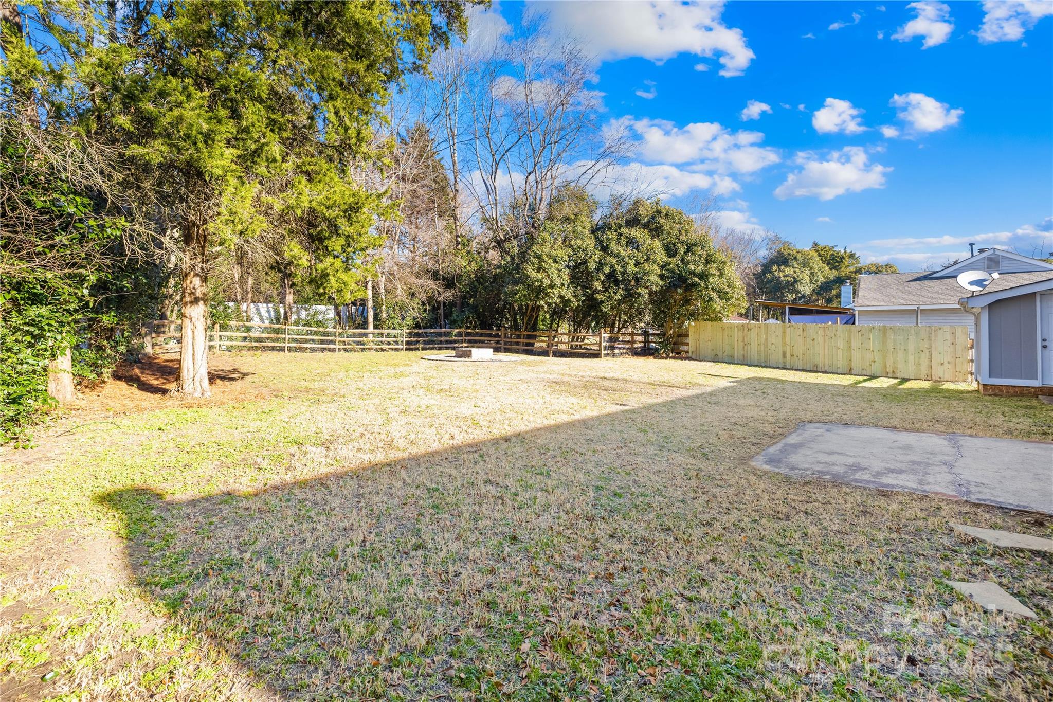 11816 Park Road Charlotte, NC 28226 - Photo 24 of 26 a view of yard with large trees