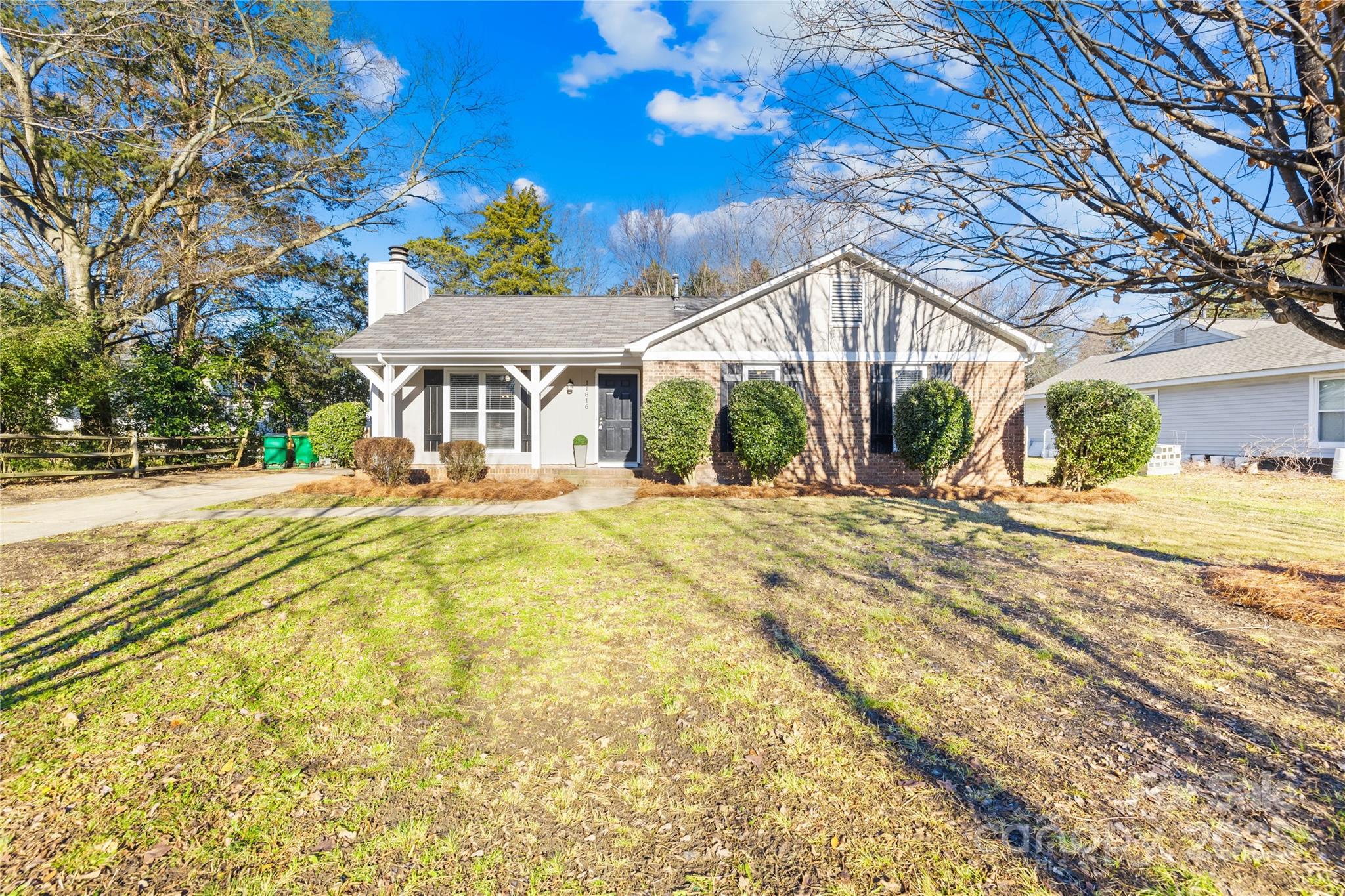 11816 Park Road Charlotte, NC 28226 - Photo 4 of 26 a view of house with yard