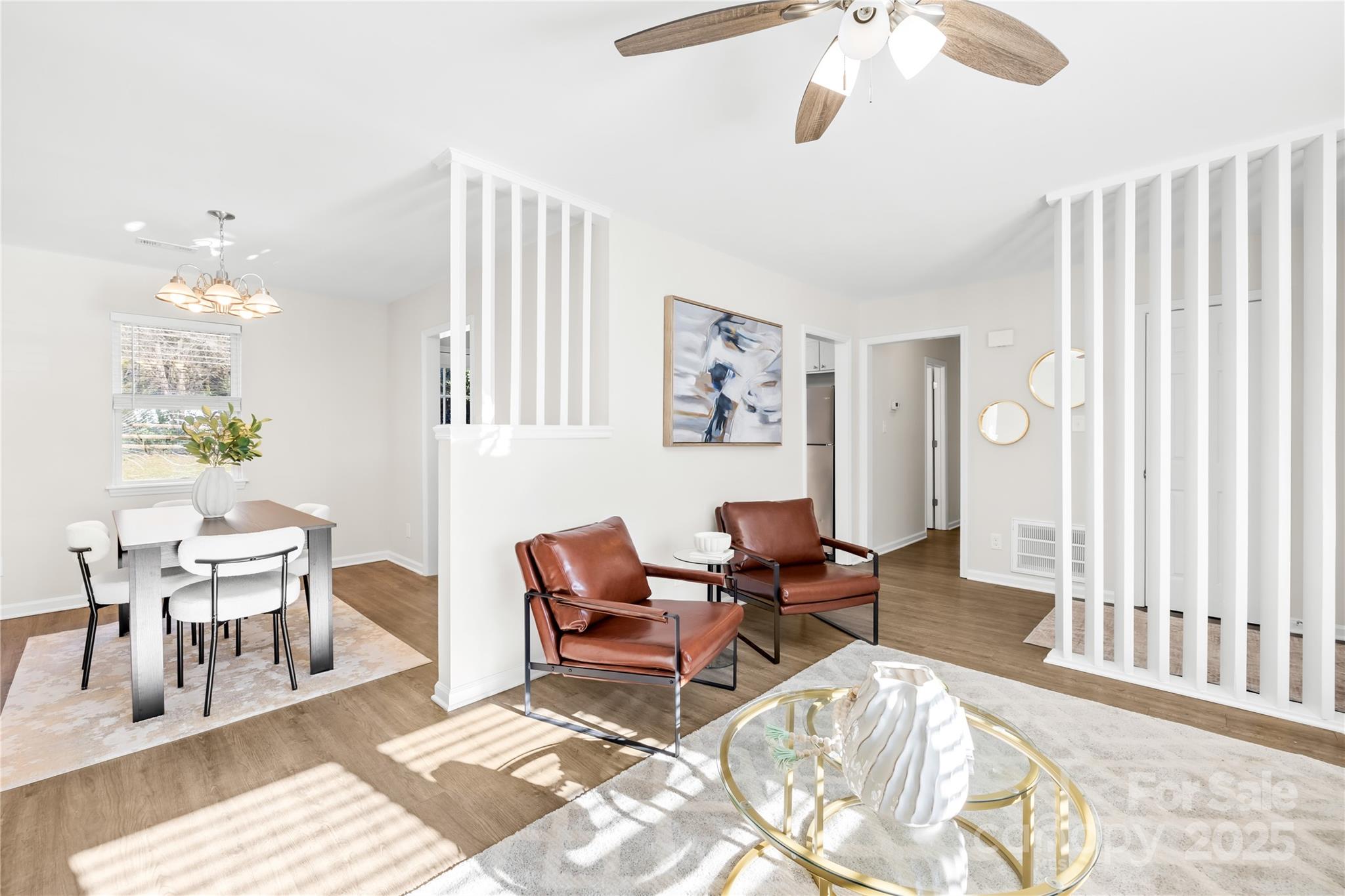 11816 Park Road Charlotte, NC 28226 - Photo 9 of 26 a living room with furniture and a wooden floor