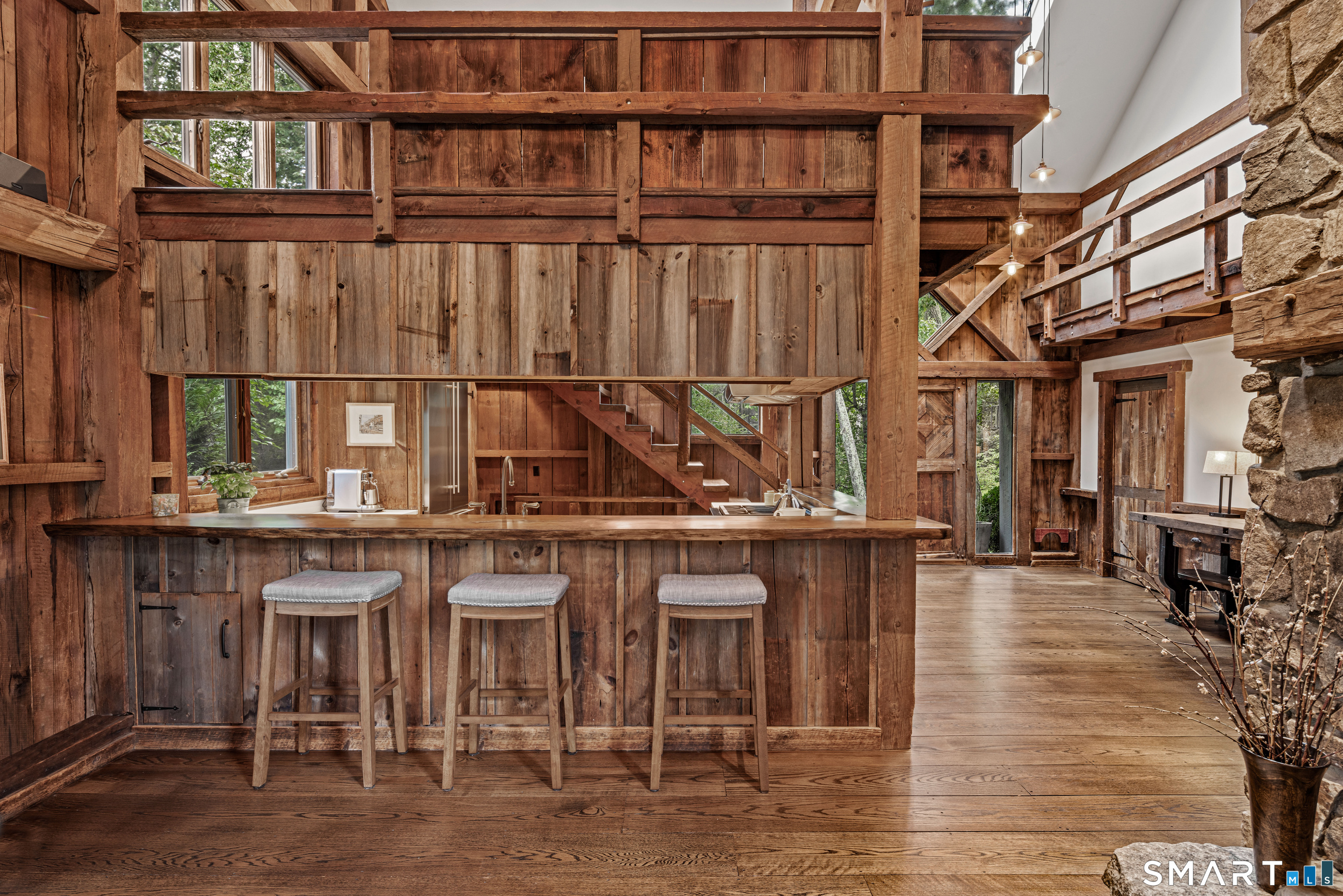 129 Davis Hill Road Weston, CT 06883 - Photo 11 of 40 a view of a chairs and table in a patio