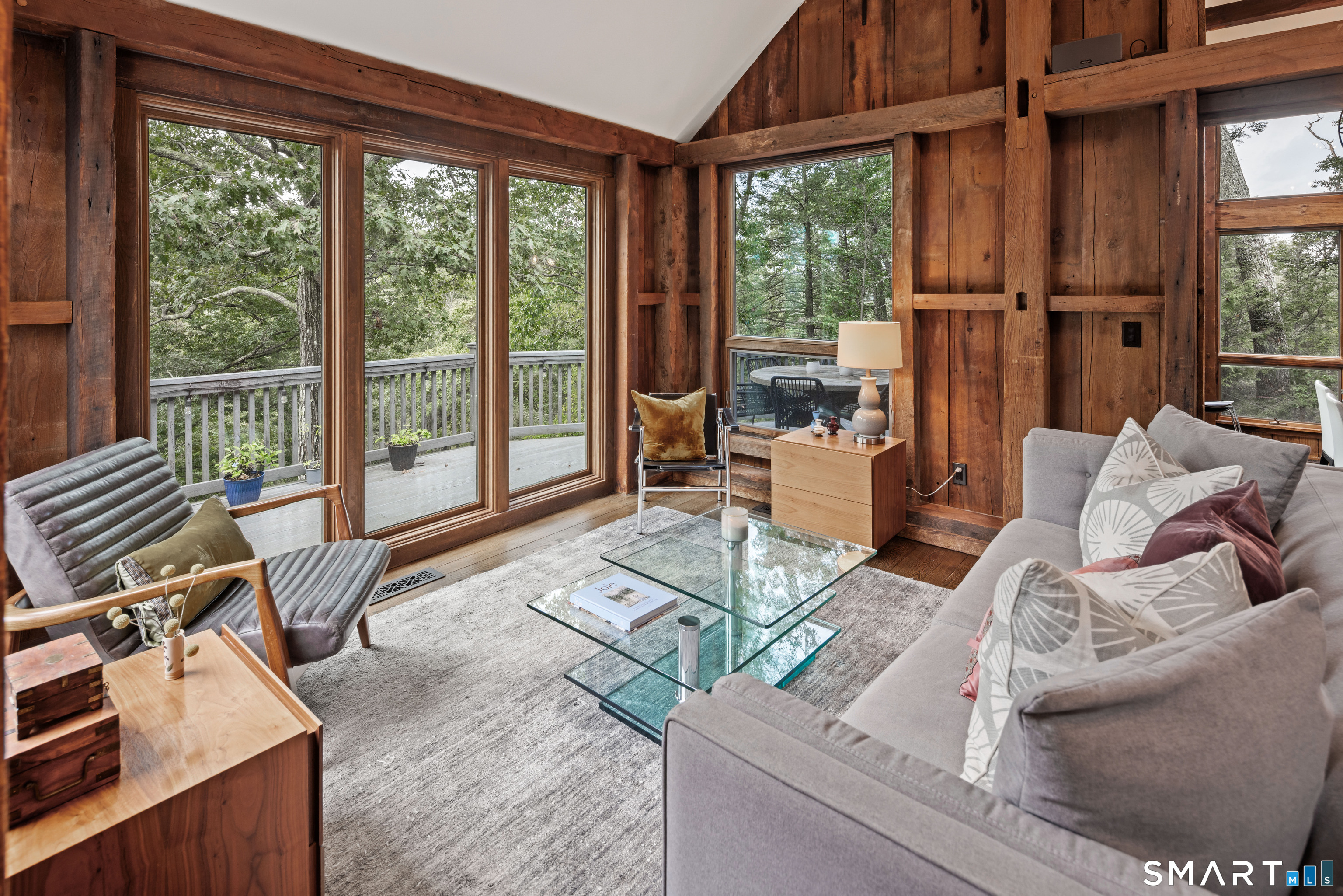 129 Davis Hill Road Weston, CT 06883 - Photo 14 of 40 a living room with furniture and a large window