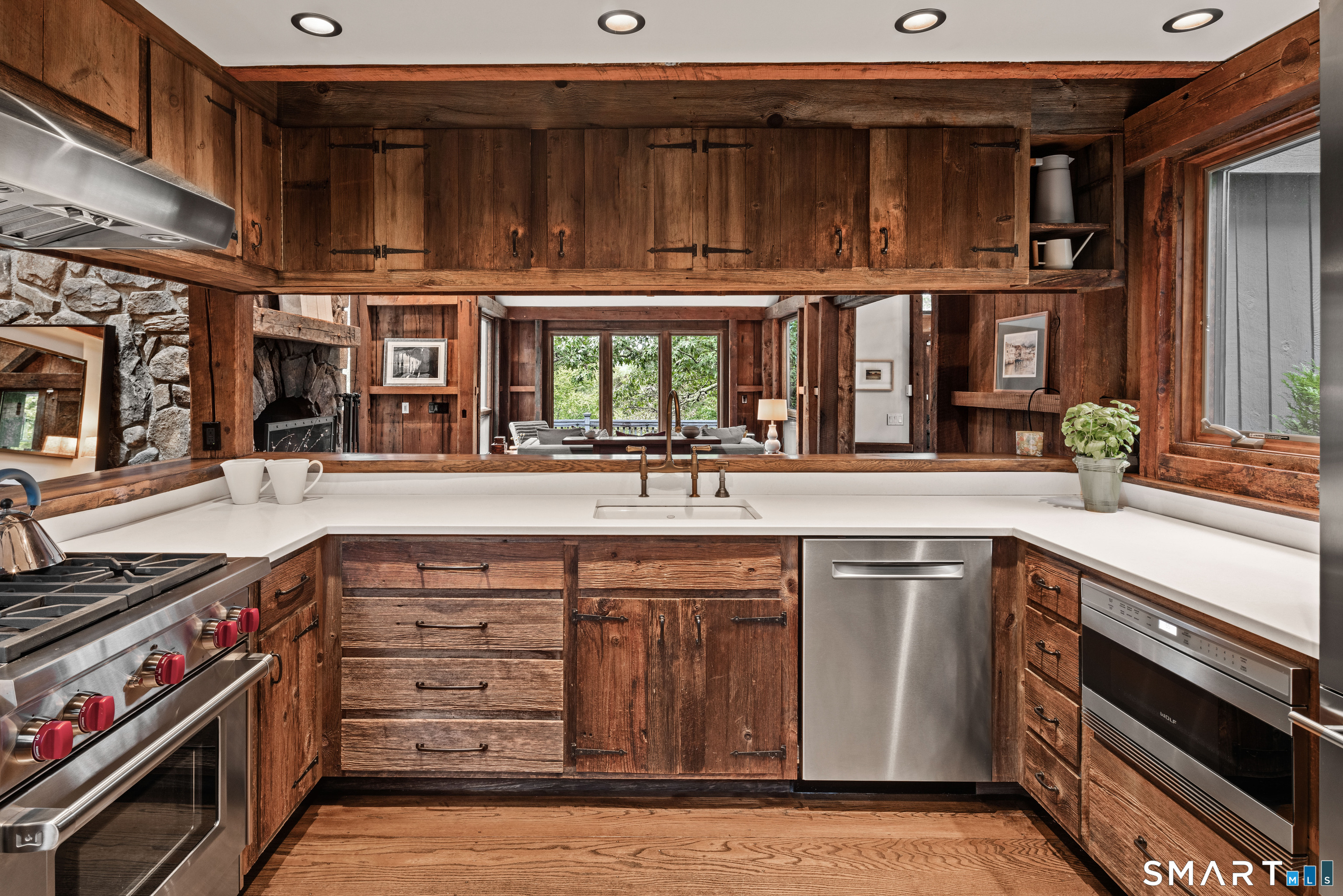 129 Davis Hill Road Weston, CT 06883 - Photo 22 of 40 a kitchen with a stove and a sink