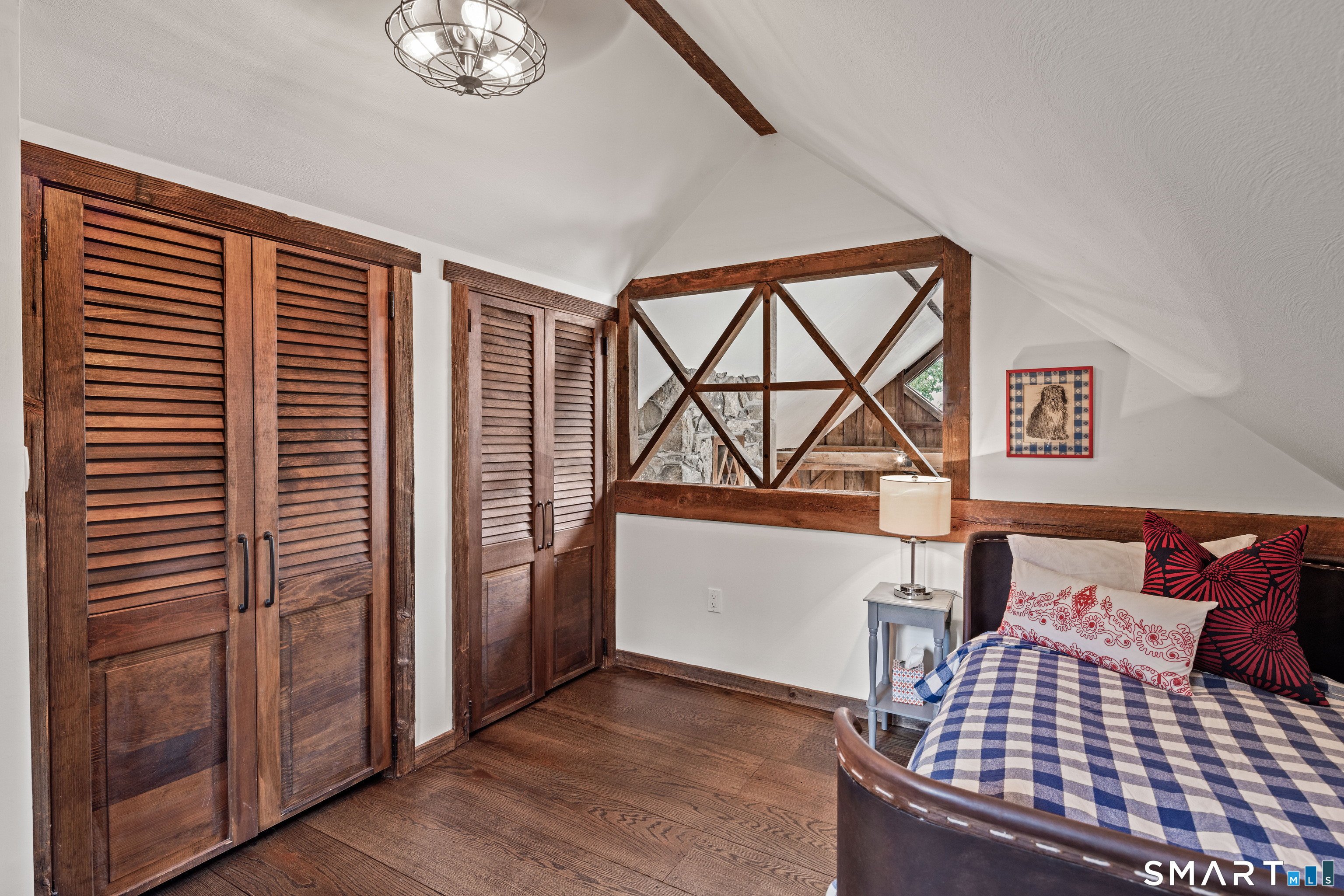 129 Davis Hill Road Weston, CT 06883 - Photo 31 of 40 a bedroom with a bed and a window