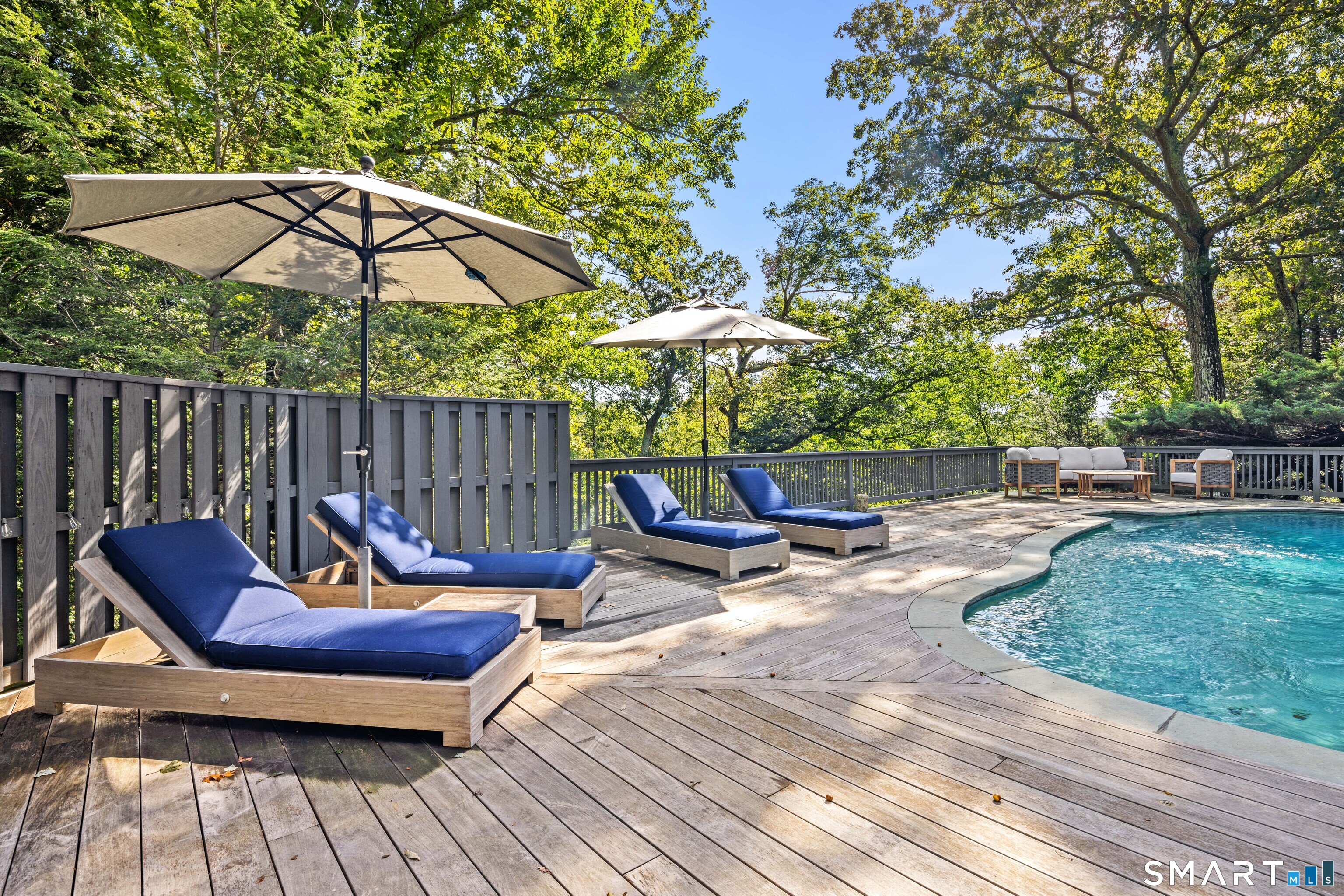 129 Davis Hill Road Weston, CT 06883 - Photo 5 of 40 a view of backyard with swimming pool and furniture