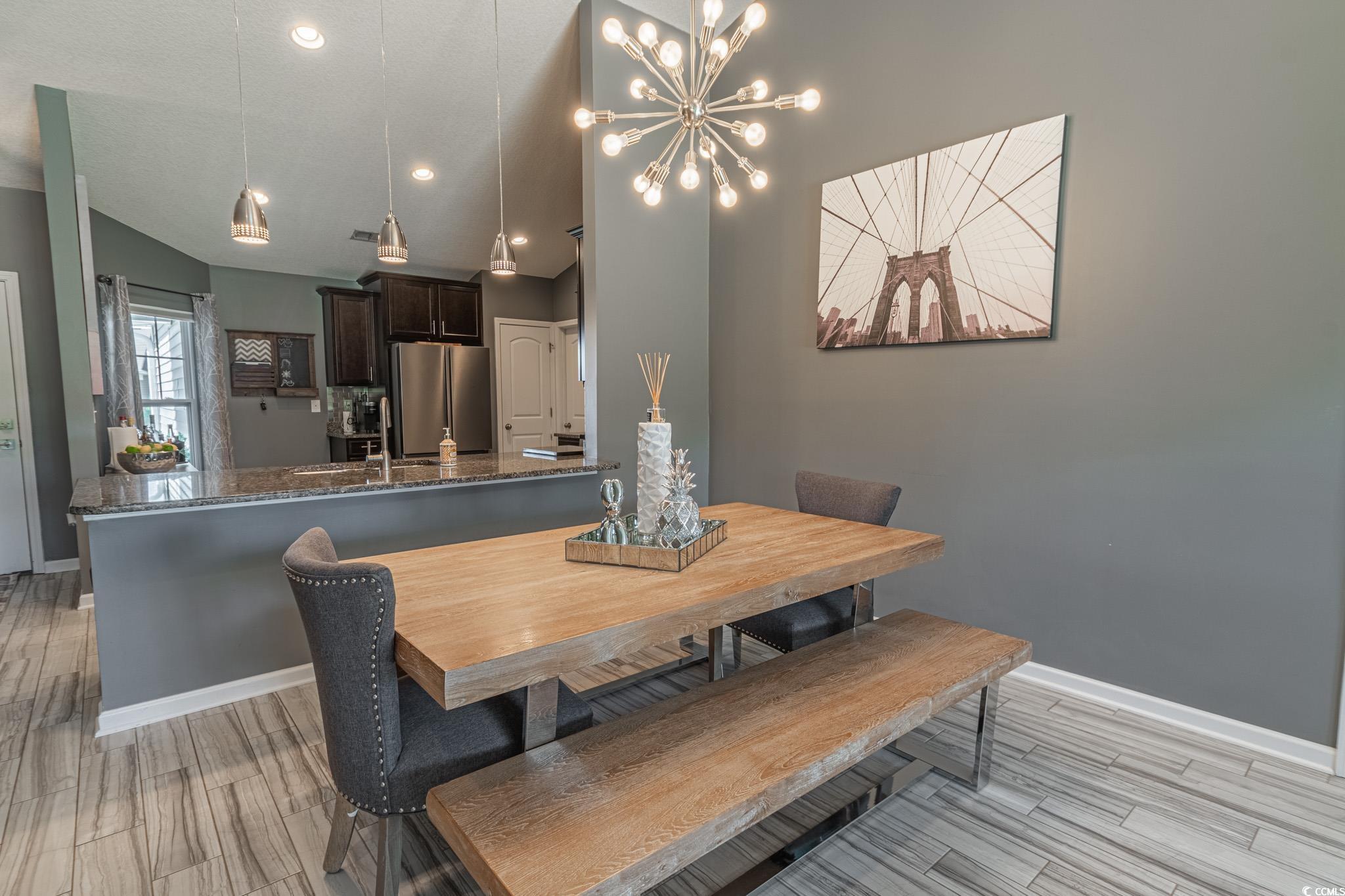 793 Old Castle Loop Myrtle Beach, SC 29579 - Photo 13 of 39 Dining room with light hardwood / wood-style floor