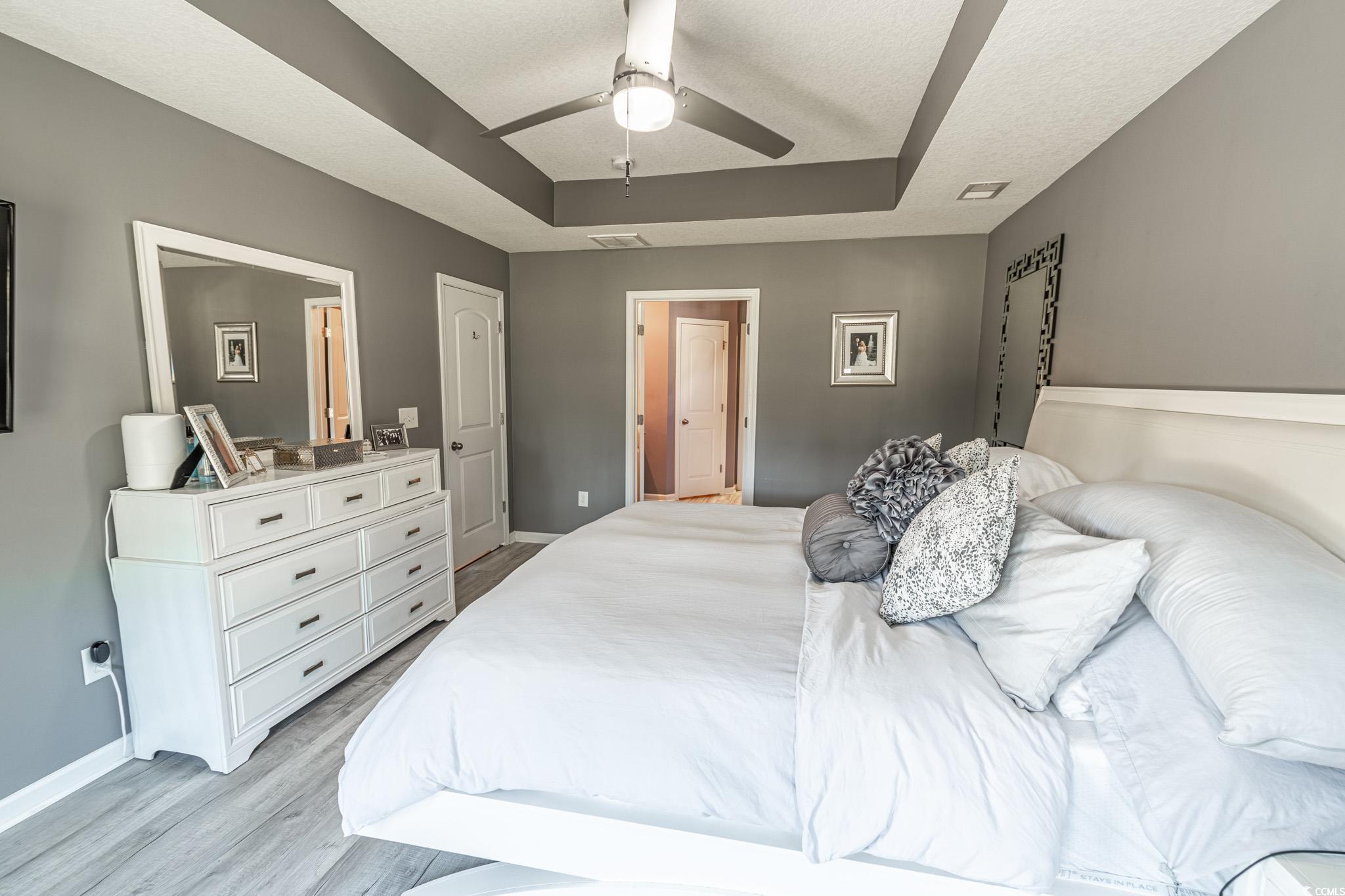 793 Old Castle Loop Myrtle Beach, SC 29579 - Photo 20 of 39 Bedroom with light wood-type flooring, ceiling fan