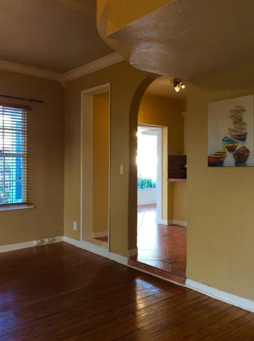 a view of livingroom with wooden floor