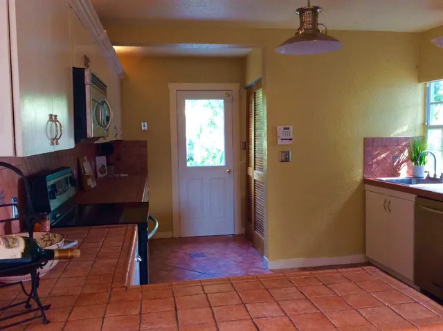 a view of livingroom with furniture and a fireplace