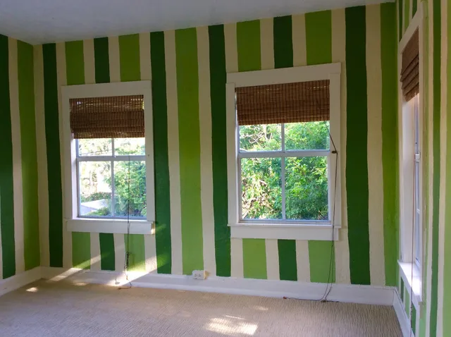 a view of a room with a large window