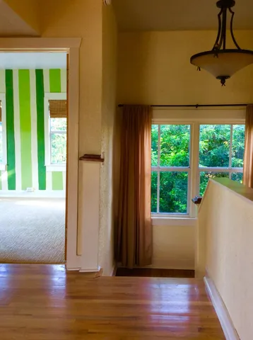 a view of entryway with wooden floor