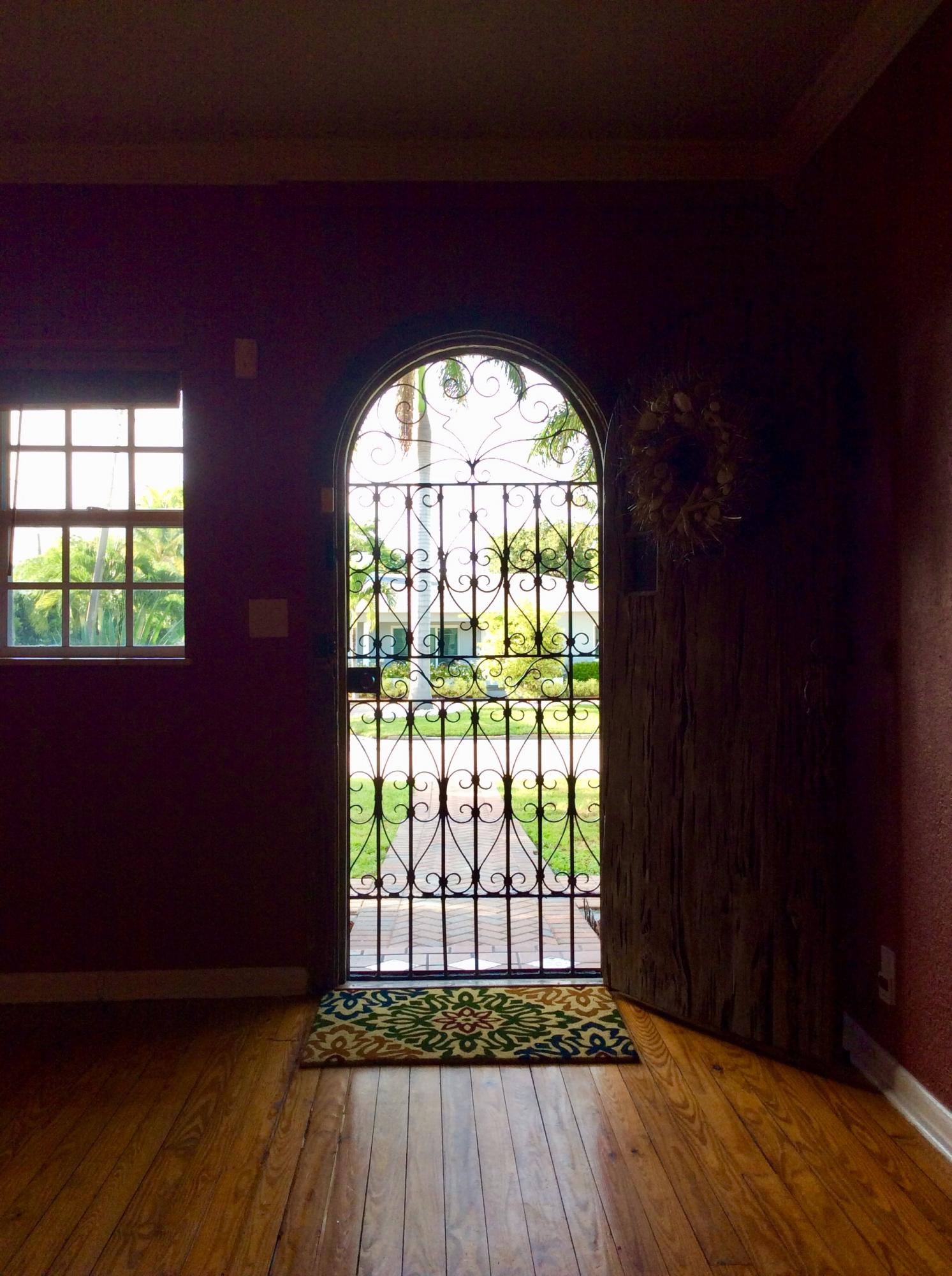 382 Ellamar Road West Palm Beach, FL 33405 - Photo 32 of 39 an empty room with wooden floor and a window