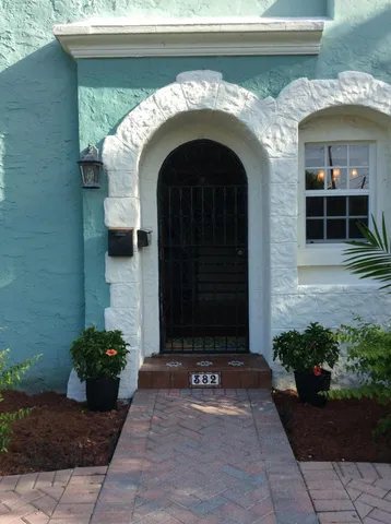 a house view with a garden space
