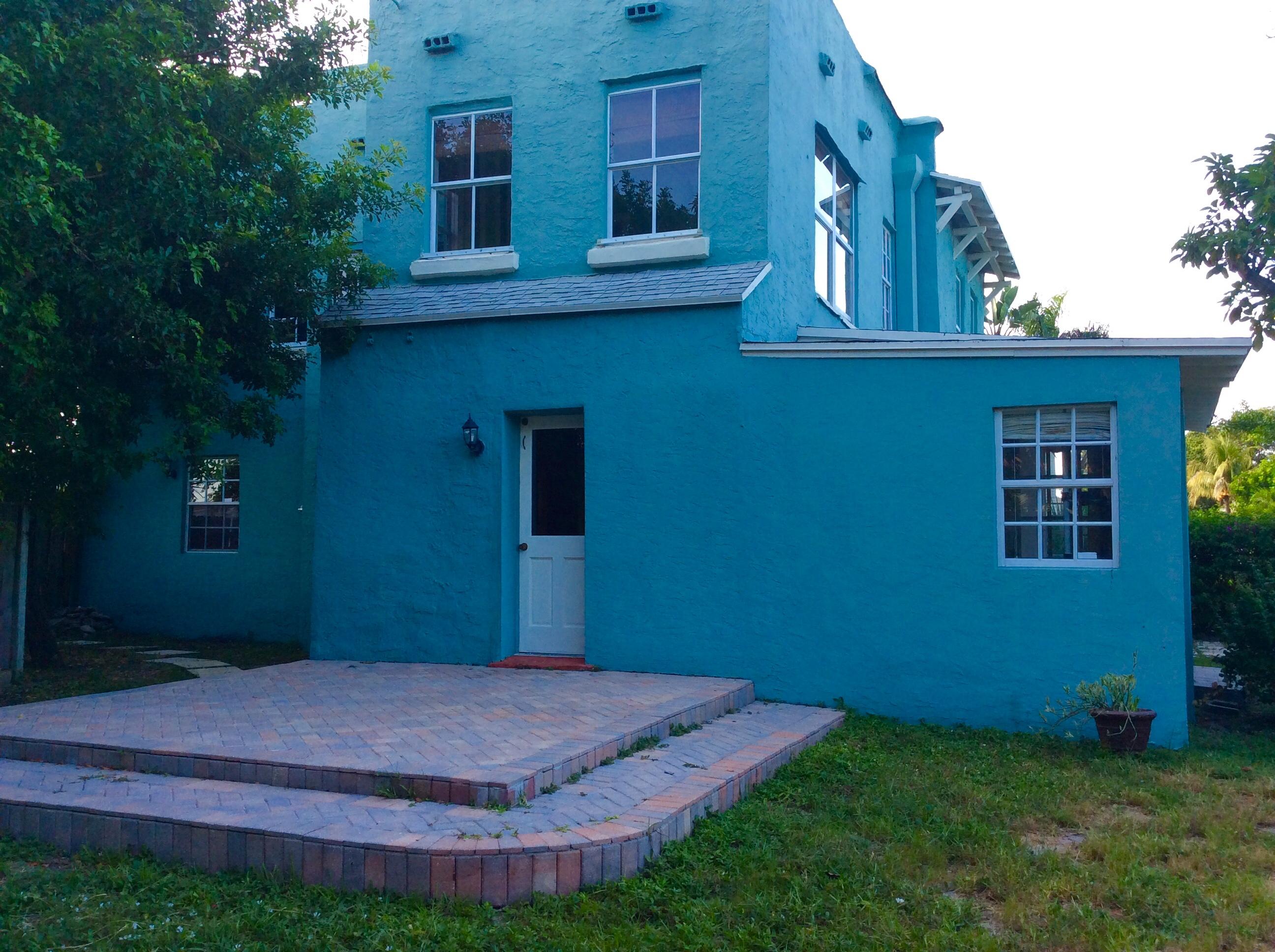 382 Ellamar Road West Palm Beach, FL 33405 - Photo 34 of 39 a house view with a garden space