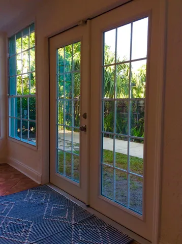 a view of a garden from a balcony