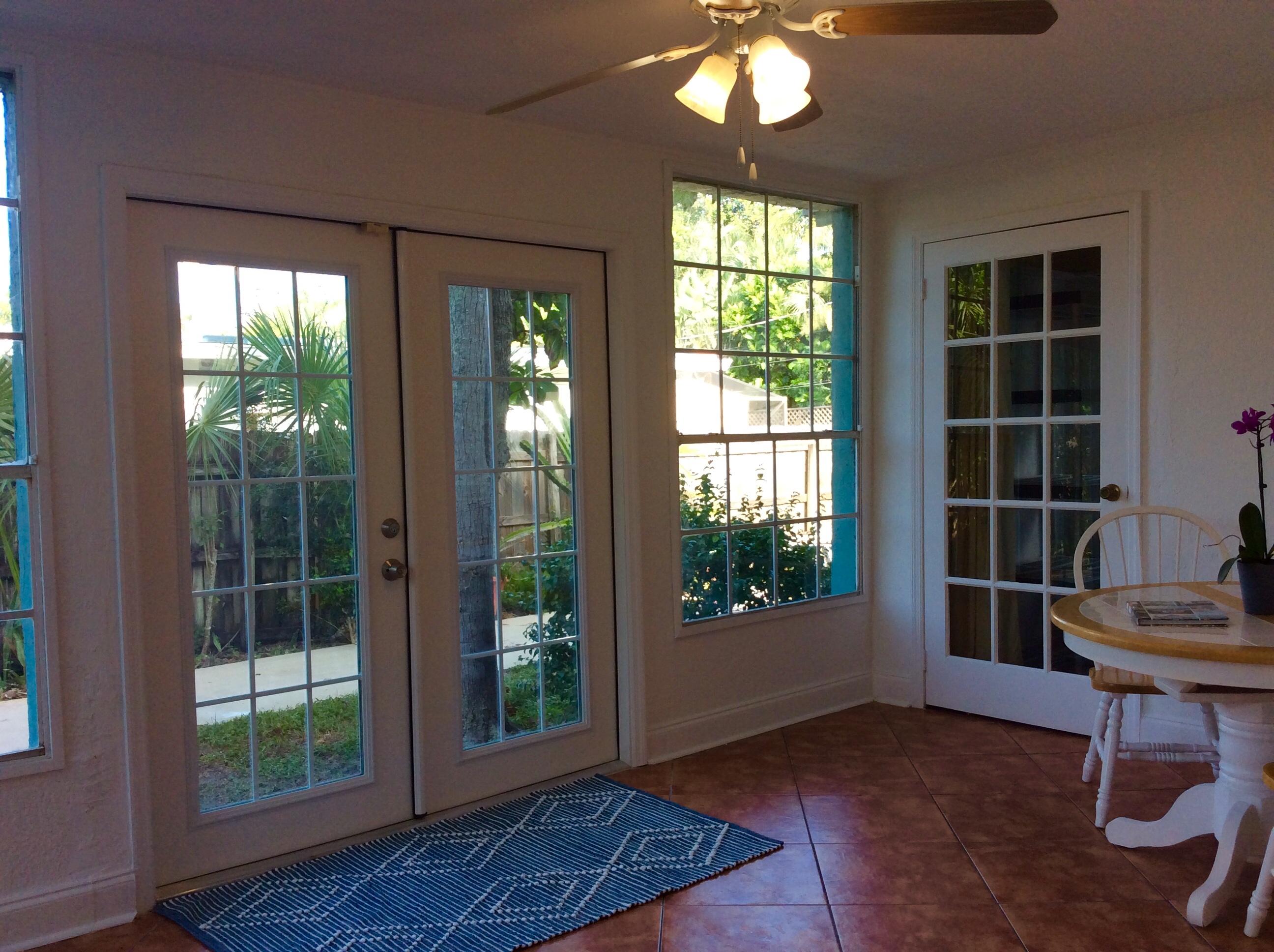 382 Ellamar Road West Palm Beach, FL 33405 - Photo 7 of 39 a view of an empty room with a window