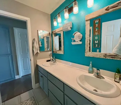 a white toilet sitting next to a shower curtain