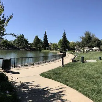 a front view of a house with a iron gate