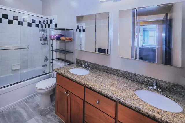 a view of a livingroom with furniture and wooden floor