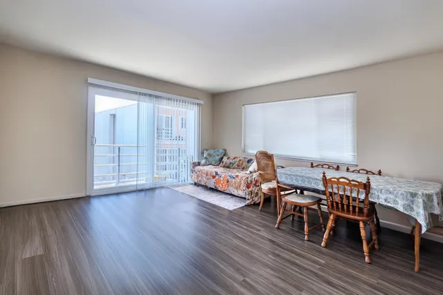 a kitchen with cabinets a sink and appliances
