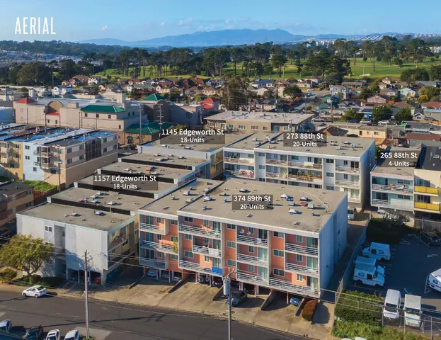 a city street lined with buildings and a street