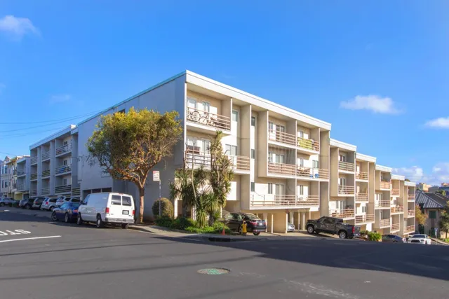 a house with swimming pool in front of it