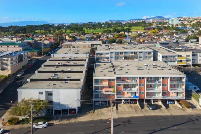 a view of a hallway with an entryway