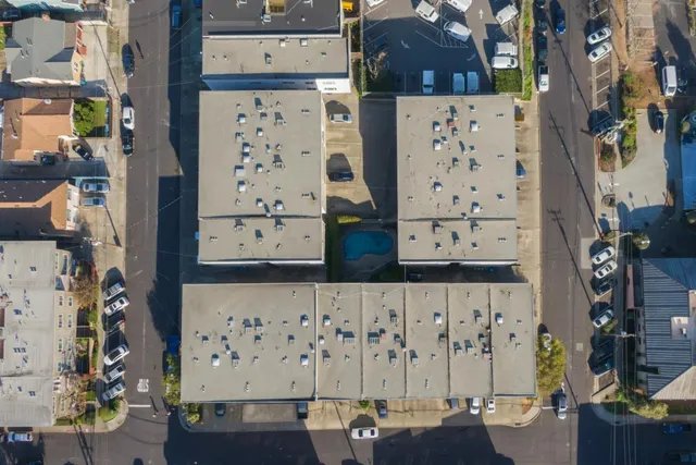a view of empty room with a fireplace