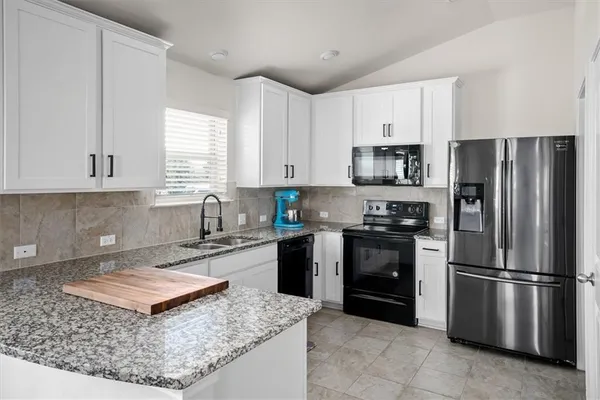 a bathroom with a sink and a bathtub