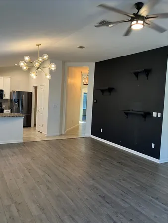 a view of a backyard of the house