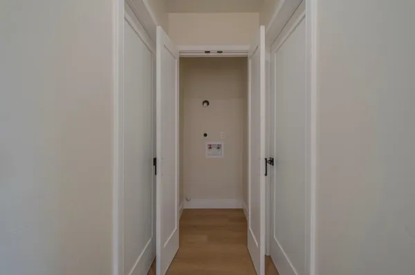 a view of a hallway with closet
