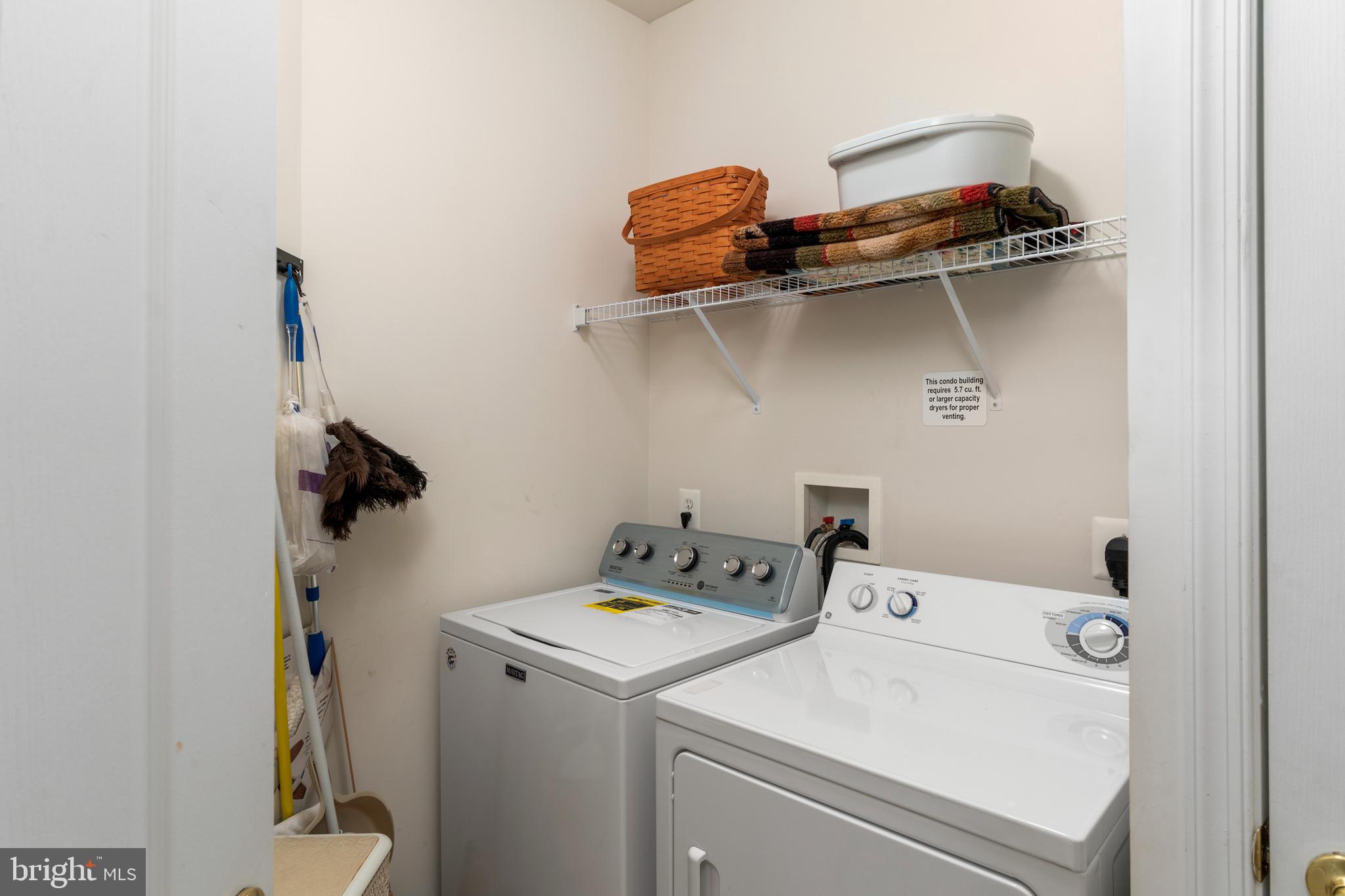 8601 Roaming Ridge Way, Unit 203 Odenton, MD 21113 - Photo 21 of 31 Laundry Closet