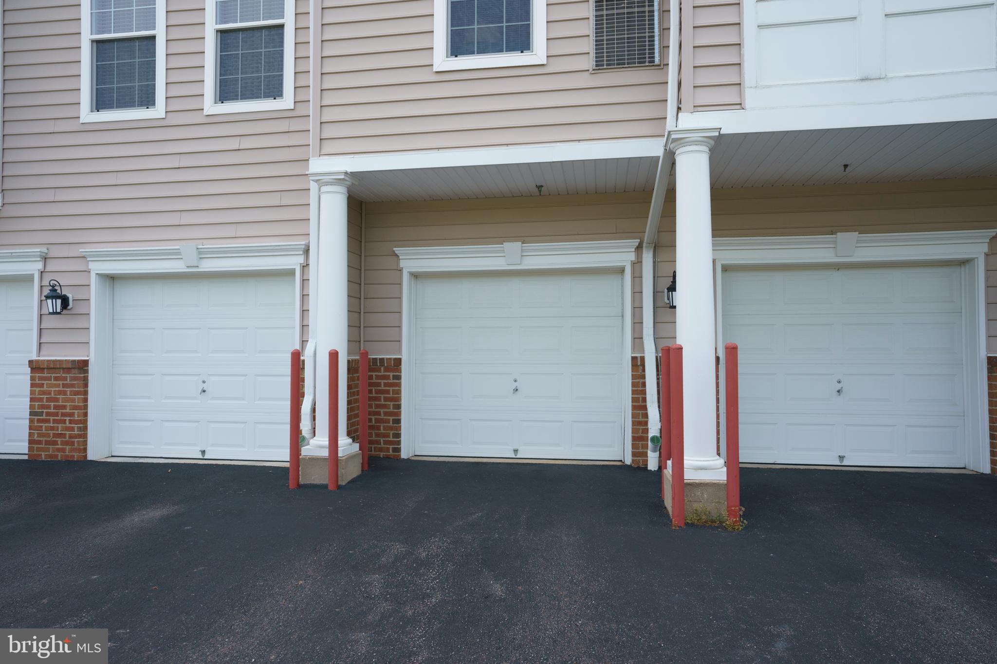 8601 Roaming Ridge Way, Unit 203 Odenton, MD 21113 - Photo 22 of 31 Attached Garage