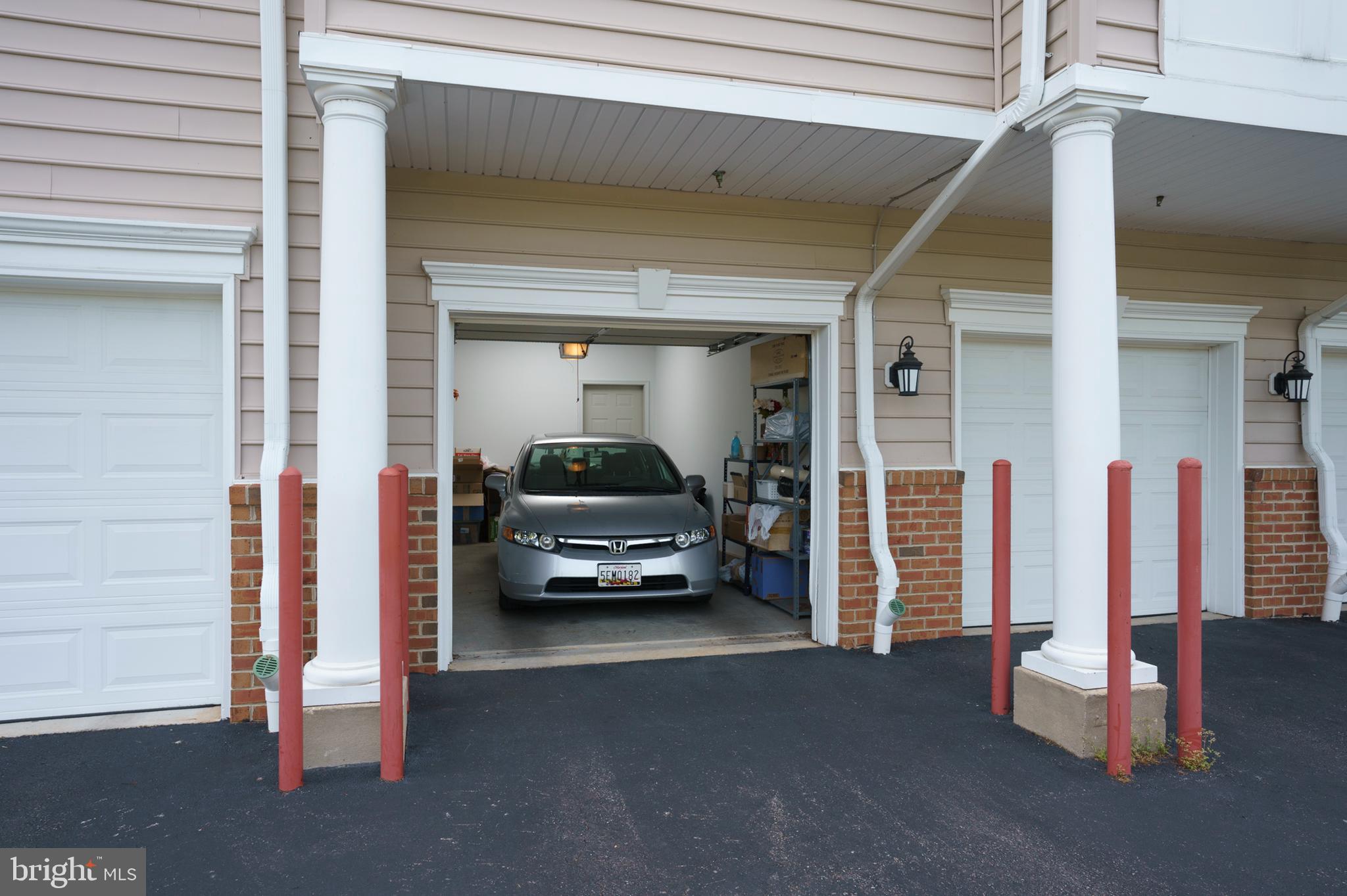8601 Roaming Ridge Way, Unit 203 Odenton, MD 21113 - Photo 23 of 31 Attached Garage (alt view)