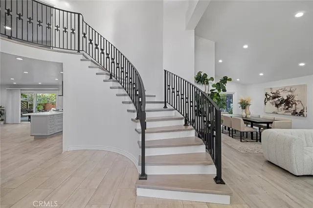 a kitchen with a table and chairs in it