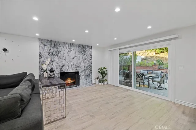 a bathroom with a double vanity sink mirror and shower