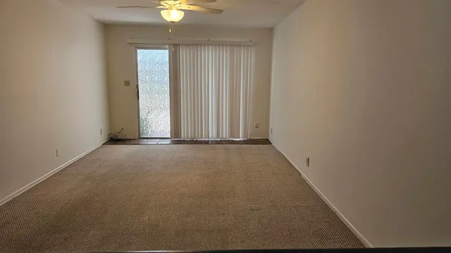 a terrace with outdoor seating and city view