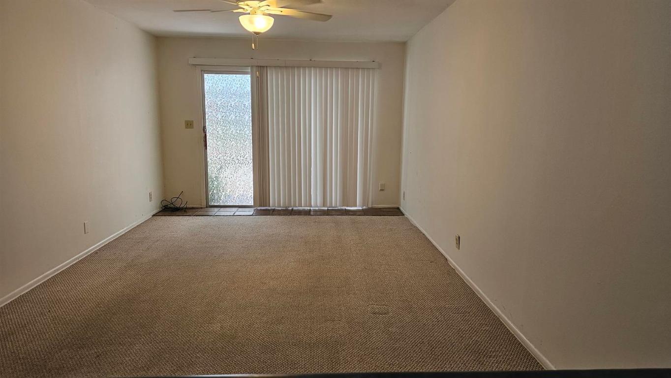 1302 Norwalk Lane Austin, TX 78703 - Photo 26 of 34 wooden floor and window in an empty room