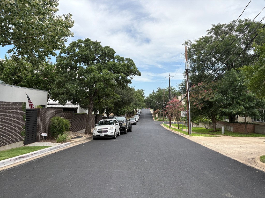 1302 Norwalk Lane Austin, TX 78703 - Photo 28 of 34 a car parked on the side of the road
