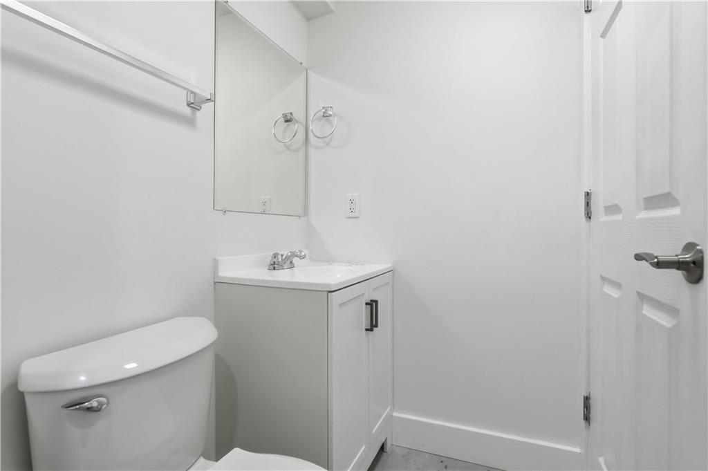 480 Songo Street Pittsburgh, PA 15227 - Photo 24 of 36 a bathroom with a sink a toilet and shower