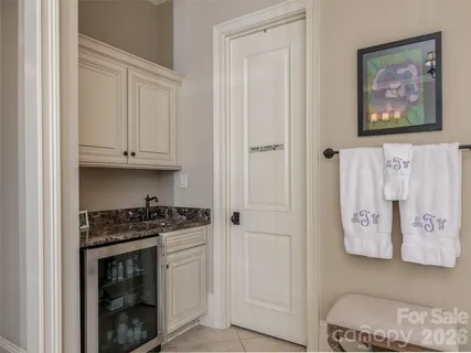 a kitchen with stainless steel appliances granite countertop a stove and a refrigerator