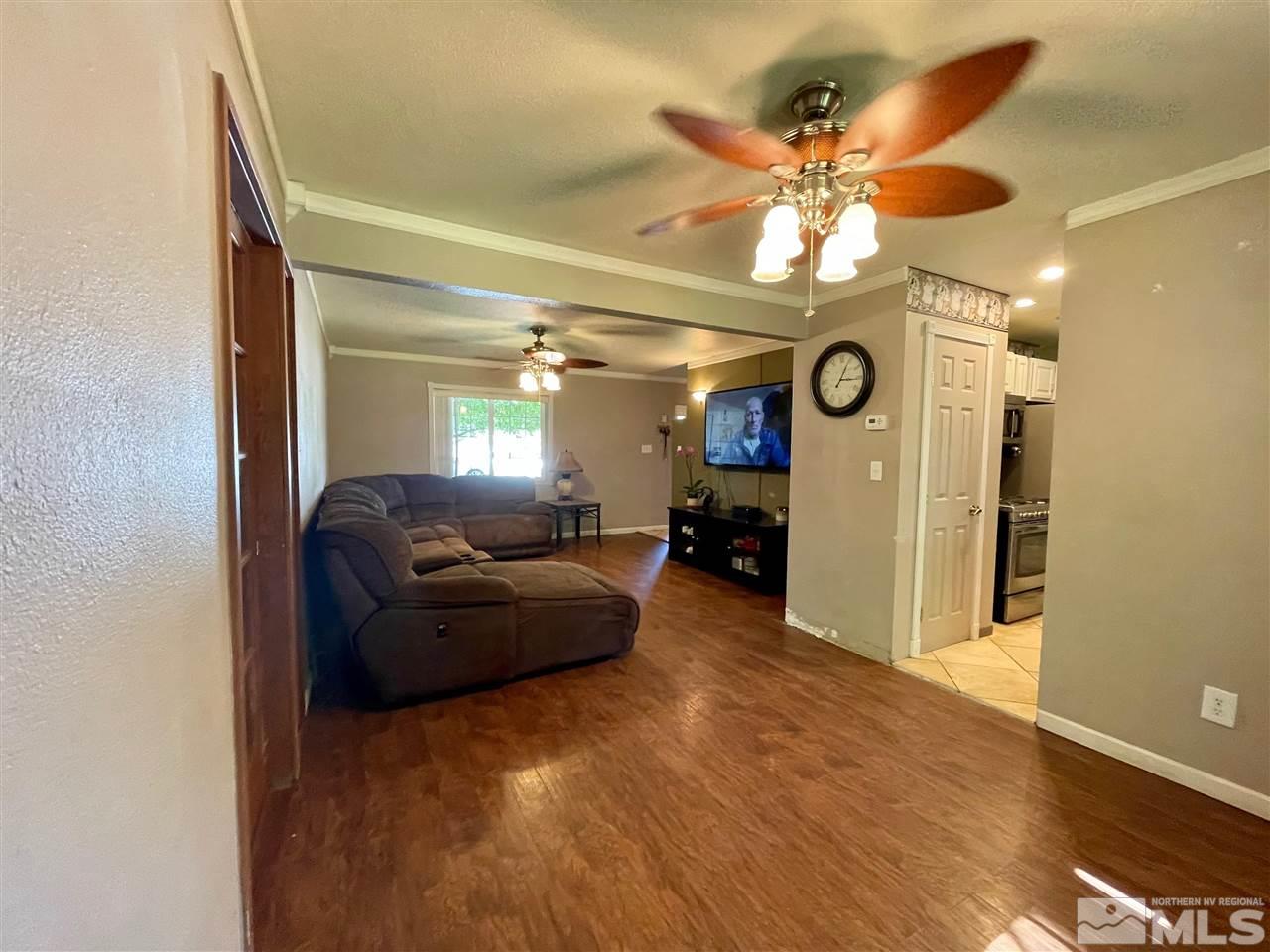 814 McLean Road Fallon, NV 89406 - Photo 5 of 40 a living room with furniture and a large window